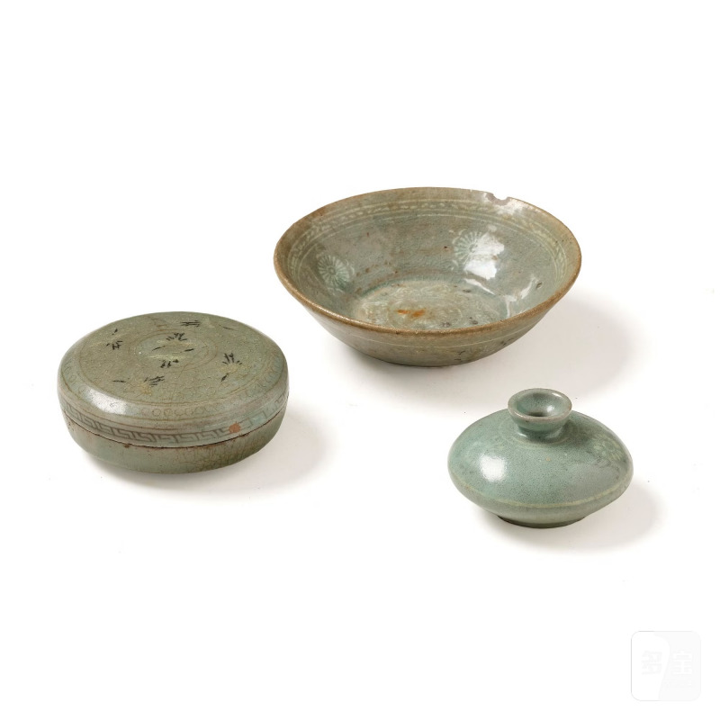 A celadon glazed slip-decorated vase,
